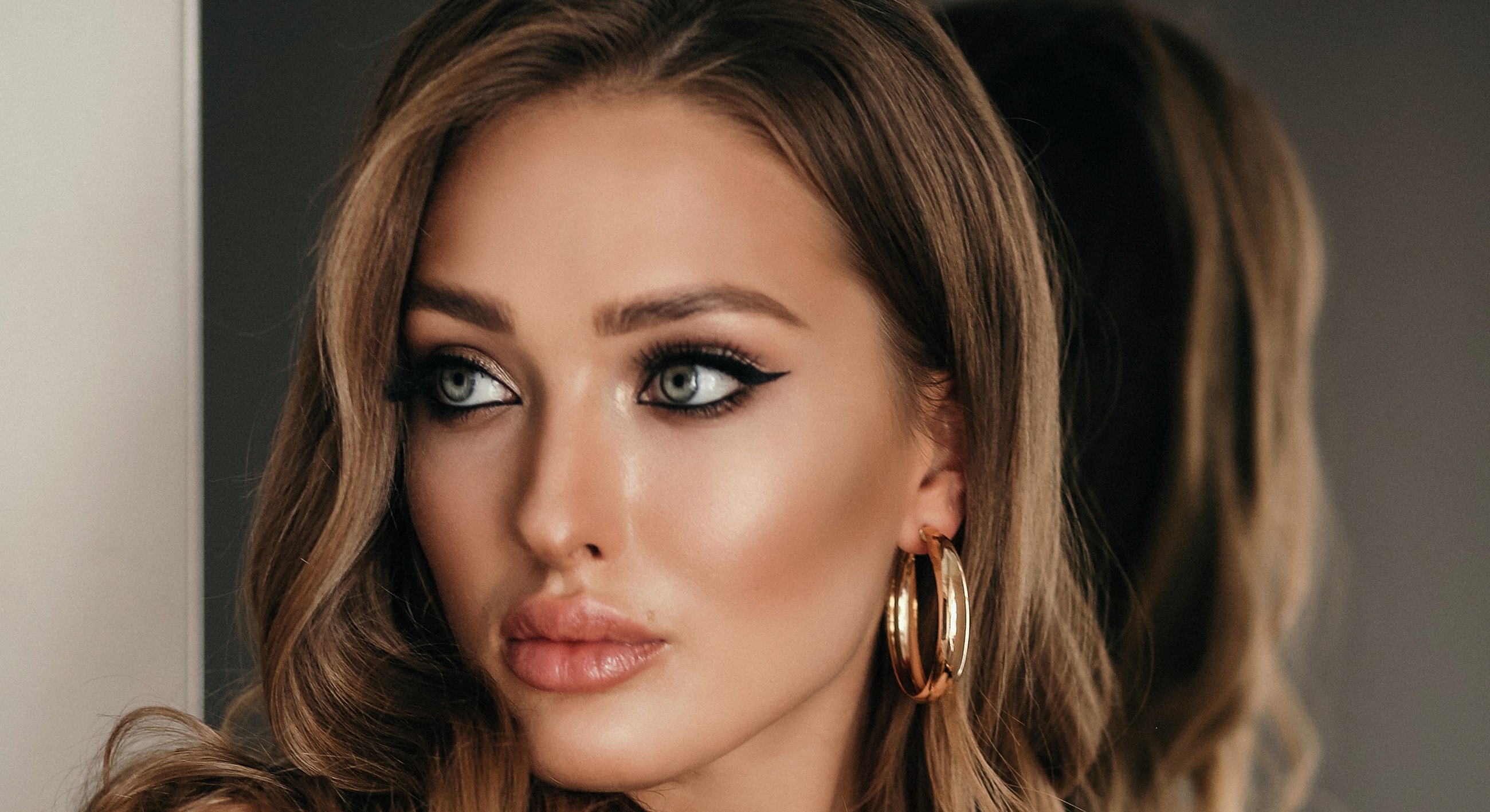 Close-up of a woman with stylish makeup.